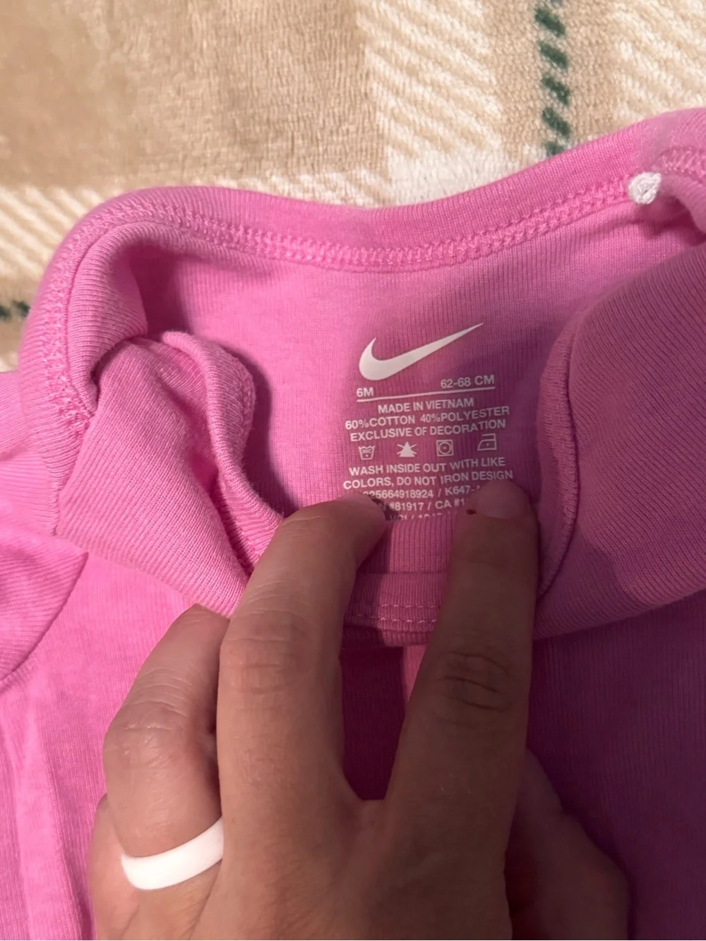 Nike Pink Short-Sleeve Infant Bodysuit with White Swoosh